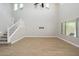 Two story living room with high ceilings, hardwood floors and large windows at 1860 W Buckhorn Trl, Phoenix, AZ 85085
