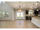 Bright kitchen with stainless steel appliances and access to backyard at 1860 W Buckhorn Trl, Phoenix, AZ 85085