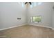 Bright living room with high ceilings and hardwood floors at 1860 W Buckhorn Trl, Phoenix, AZ 85085