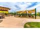 playground with shaded areas and seating at 1860 W Buckhorn Trl, Phoenix, AZ 85085