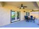 Covered patio with seating area, perfect for outdoor dining at 1860 W Buckhorn Trl, Phoenix, AZ 85085