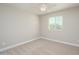 Bright bedroom with ceiling fan and carpet flooring at 1860 W Buckhorn Trl, Phoenix, AZ 85085