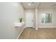 Light and airy entryway with floating shelf at 1860 W Buckhorn Trl, Phoenix, AZ 85085