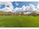Landscaped backyard with mountain views at 1860 W Buckhorn Trl, Phoenix, AZ 85085