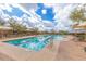 Inviting community pool with lounge chairs at 1860 W Buckhorn Trl, Phoenix, AZ 85085