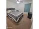 Bright bedroom with carpeted floor and ceiling fan at 14602 S 47Th St, Phoenix, AZ 85044