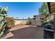 Large backyard with brick patio and mature plants at 2501 E Pepper Ridge Cir, Phoenix, AZ 85032