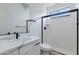 Modern bathroom with white vanity and walk-in shower at 18888 E Apricot Ln, Queen Creek, AZ 85142