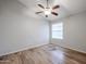 Bedroom with wood flooring and a ceiling fan at 2930 E Leland St, Mesa, AZ 85213