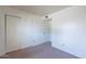 Simple bedroom with neutral walls and carpet at 1023 E Escuda Dr, Phoenix, AZ 85024