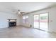 Living room with fireplace and sliding glass doors at 1023 E Escuda Dr, Phoenix, AZ 85024