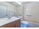 Bathroom with tub, shower, single sink vanity at 1023 E Escuda Dr, Phoenix, AZ 85024