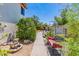 Backyard with hot tub, sitting area, and water feature at 1023 E Escuda Dr, Phoenix, AZ 85024