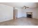 Living room featuring a fireplace and tile floors at 1023 E Escuda Dr, Phoenix, AZ 85024