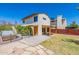 Home's backyard with hot tub and flagstone patio at 1023 E Escuda Dr, Phoenix, AZ 85024