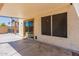 Covered patio with sliding glass doors and screen windows at 1023 E Escuda Dr, Phoenix, AZ 85024