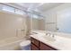 Clean bathroom with a tub, shower, and updated vanity at 1023 E Escuda Dr, Phoenix, AZ 85024