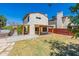 Home features a spacious backyard with a patio, hot tub, and grassy area at 1023 E Escuda Dr, Phoenix, AZ 85024