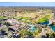 Aerial view of community with clubhouse, pool, and golf course at 19661 N Echo Rim Dr, Surprise, AZ 85387
