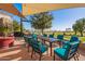 Outdoor patio with seating area and golf course view at 19661 N Echo Rim Dr, Surprise, AZ 85387