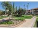 Well-maintained courtyard with lush landscaping and walkways at 17404 N 99Th Ave # 337, Sun City, AZ 85373