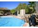 Relaxing pool with a rock waterfall and a private backyard setting at 15234 N 19Th Pl, Phoenix, AZ 85022