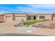Home with a two-car garage and front yard at 15234 N 19Th Pl, Phoenix, AZ 85022