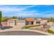 Home with solar panels, landscaping, and city views at 15234 N 19Th Pl, Phoenix, AZ 85022