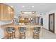 Eat-in kitchen features granite countertops and wood cabinets at 15234 N 19Th Pl, Phoenix, AZ 85022