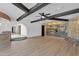 Gathering room with a stone fireplace and built-in entertainment center at 15234 N 19Th Pl, Phoenix, AZ 85022