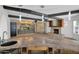 Gathering room with wet bar and wood beams at 15234 N 19Th Pl, Phoenix, AZ 85022