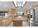 Kitchen boasts granite countertops and skylight at 15234 N 19Th Pl, Phoenix, AZ 85022