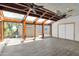 Bright bonus room with wood ceiling, tile floors, and sliding glass doors leading to the backyard at 15234 N 19Th Pl, Phoenix, AZ 85022