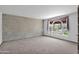 Spacious bedroom with neutral colored walls and carpet flooring at 15234 N 19Th Pl, Phoenix, AZ 85022