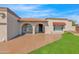 Front entry with arched doorways and awning at 15234 N 19Th Pl, Phoenix, AZ 85022
