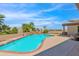 Relaxing kidney-shaped pool with mountain views and a fire pit at 15234 N 19Th Pl, Phoenix, AZ 85022