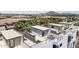 Private rooftop patio with seating and city views at 1501 N Miller Rd # 1009, Scottsdale, AZ 85257