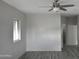Spacious bedroom with gray walls and wood-look flooring at 17836 N 21St St, Phoenix, AZ 85022