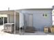 Rear view of house showing AC unit, storage, and access door at 17836 N 21St St, Phoenix, AZ 85022