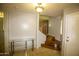 Entryway with staircase and glass-top console table at 20221 N 31St St, Phoenix, AZ 85050