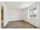 Well-lit bedroom featuring a large window and neutral wall colors at 3313 N 68Th St # 203, Scottsdale, AZ 85251