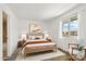 Comfortable bedroom with a double bed and adjacent bathroom access at 3313 N 68Th St # 203, Scottsdale, AZ 85251