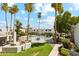Community pool with lush landscaping and grilling area at 3313 N 68Th St # 203, Scottsdale, AZ 85251