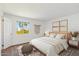 Bright bedroom with a queen-size bed, and large window at 3313 N 68Th St # 203, Scottsdale, AZ 85251