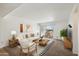 Living room with access to patio, stylish furniture at 3313 N 68Th St # 203, Scottsdale, AZ 85251