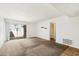 Spacious living room with carpeting and access to patio at 3313 N 68Th St # 203, Scottsdale, AZ 85251