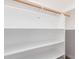 White shelving unit with wood rod, ideal for storage at 930 Leisure World --, Mesa, AZ 85206