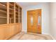 Entryway with wood built-ins and tile flooring at 930 Leisure World --, Mesa, AZ 85206