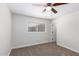 Bright bedroom with window blinds and ceiling fan at 930 Leisure World --, Mesa, AZ 85206
