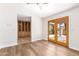 Dining area with wood floors and access to the patio at 930 Leisure World --, Mesa, AZ 85206